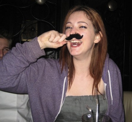 a woman with a mustache on her mouth