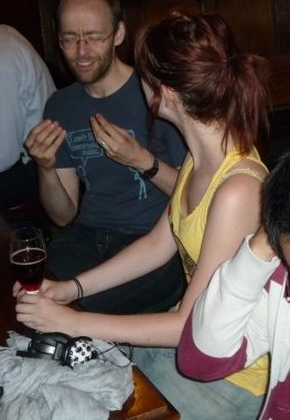 a group of people sitting around a table