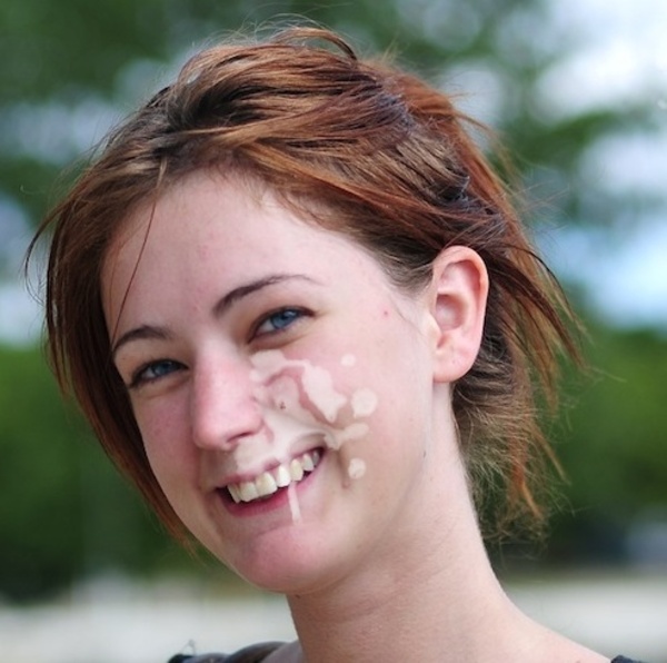 a woman with cum on her face and brown hair