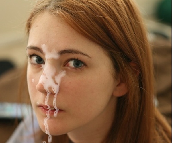 a girl with cum on her nose