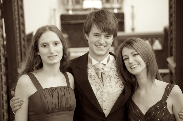 three young people posing for a picture