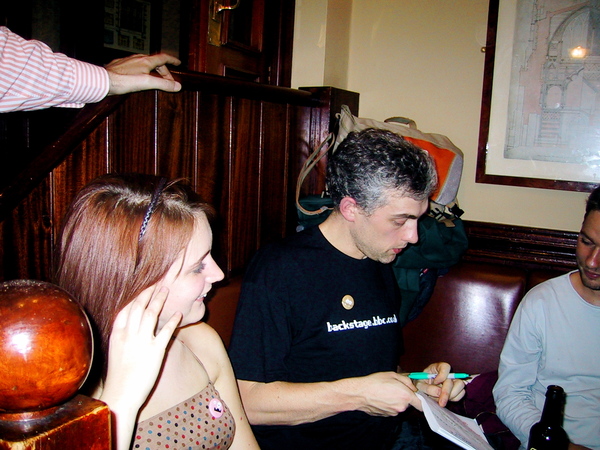 a man and woman sitting on a couch