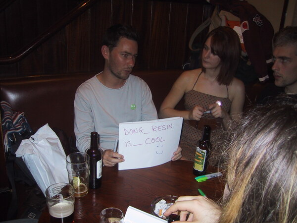 a group of people sitting around a table