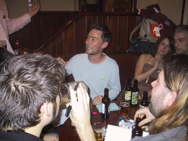 a group of people sitting around a table