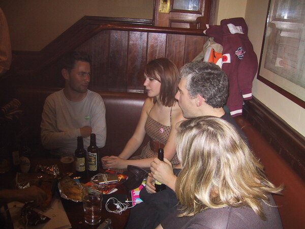 a group of people sitting around a table