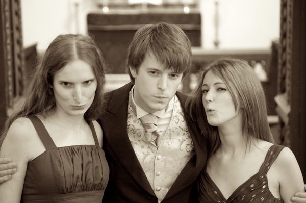 three young people posing for a photo