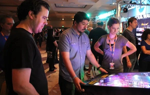 a group of people playing a game at a party