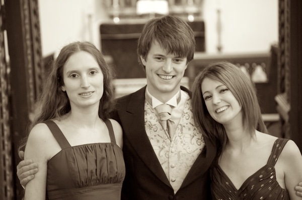 three young people posing for a photo