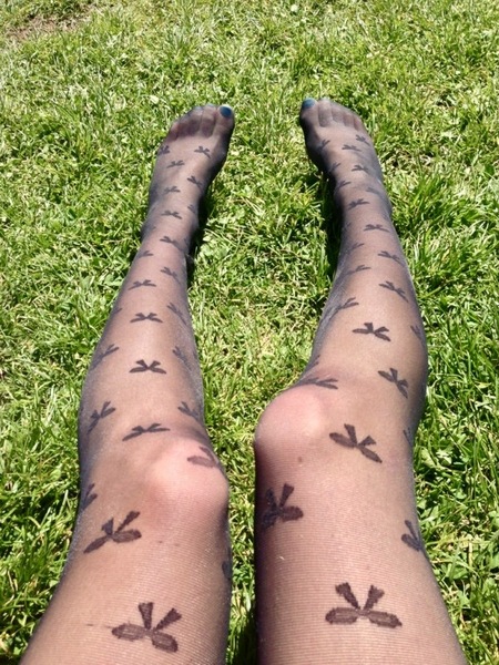 a person with tattoos on their legs