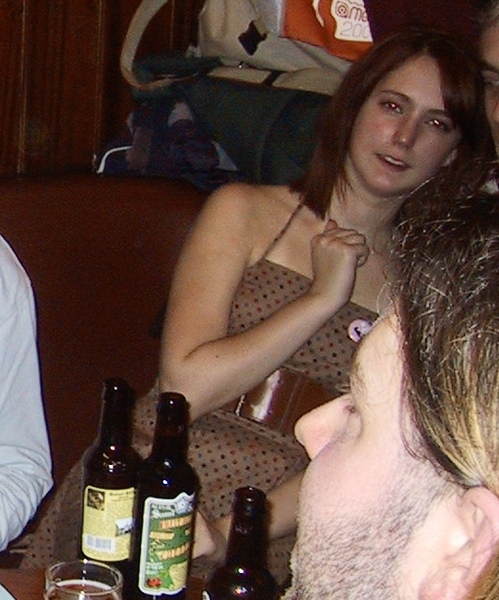 a group of people sitting around a table