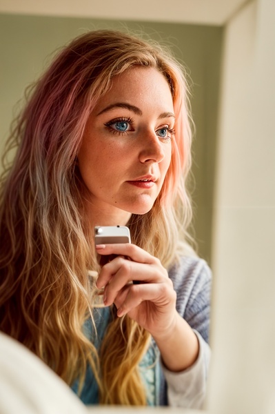 a woman with long blonde hair