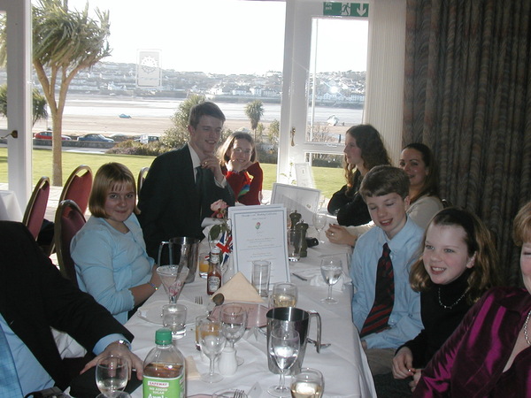 a group of people sitting around a table