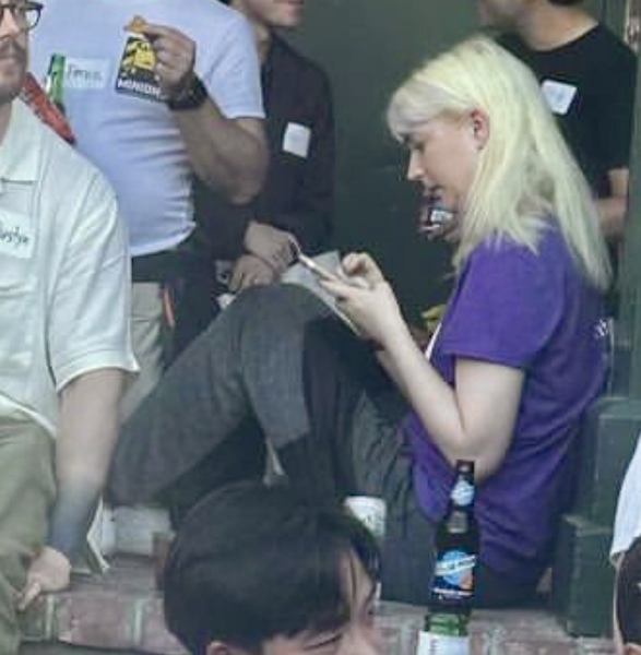 a group of people sitting on the steps