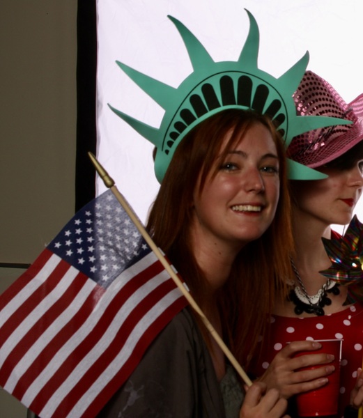 two women holding american flags