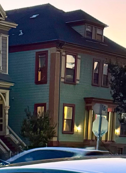 a car parked in front of a house