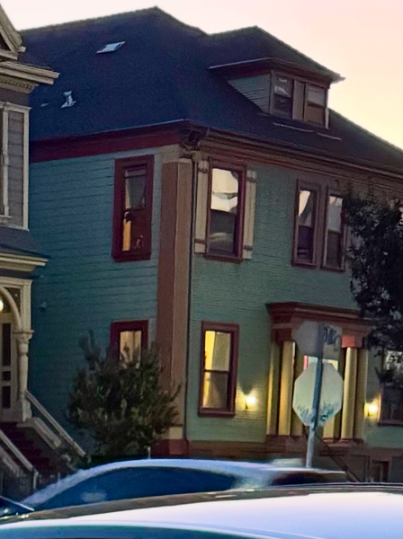 a house with a car parked in front of it