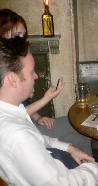 a man and a woman sitting at a table