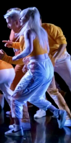 a group of people in a dance pose