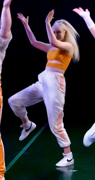 a group of people in a dance pose