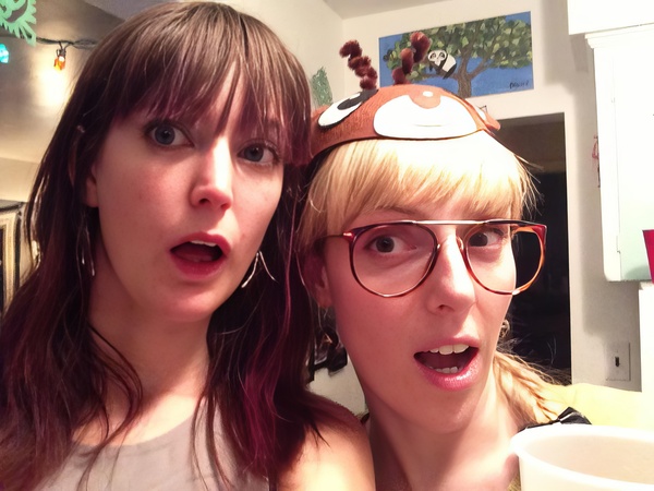 two women with glasses and a hat on