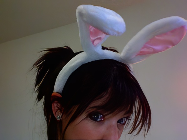 a woman with a bunny ears on her head