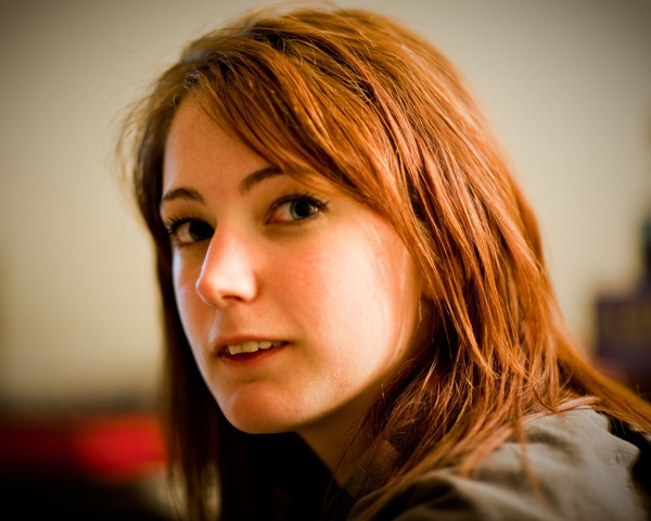 a woman with long red hair