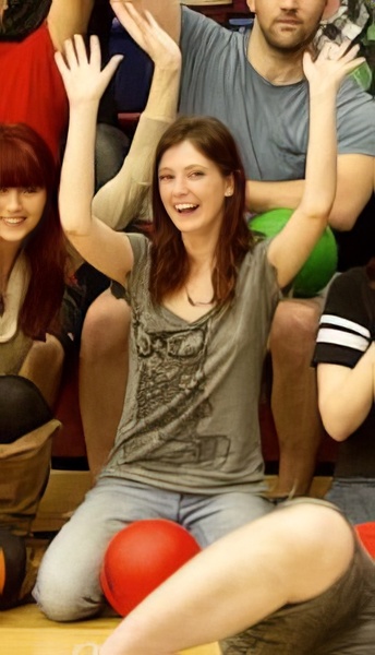 a group of people sitting on the floor