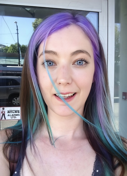 a woman with purple and blue hair ns amy {