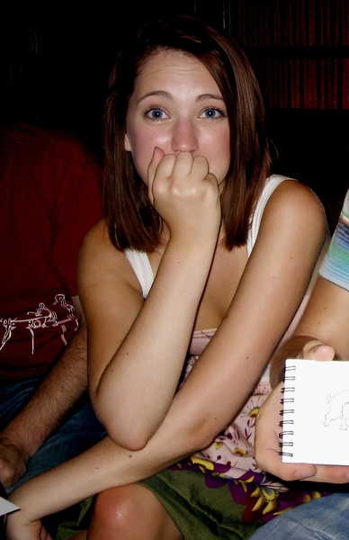 a woman sitting on a couch