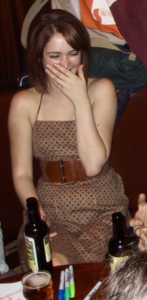 a woman sitting at a table