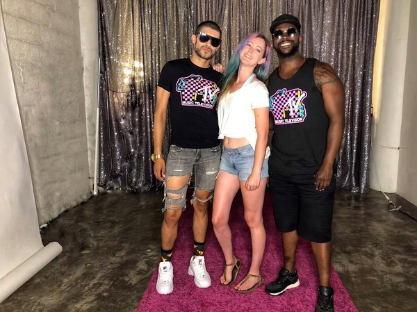 a man and woman posing for a photo in front of a backdrop ne Se

theses 4
tanatity Ae ee: means oi &s ;
1 pee ey ,
faa Oi . ese ne Reieaedaromaas ee
ao
OS Po ose 2 -
ro a oe
we
ae, ‘
ta. .
Fi
«era ang RAMS ORES Ne FEET
a ed sree eM a ed