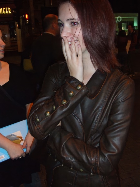 woman wearing a black leather jacket