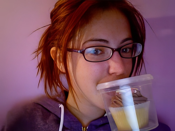 a woman drinking a glass of milk