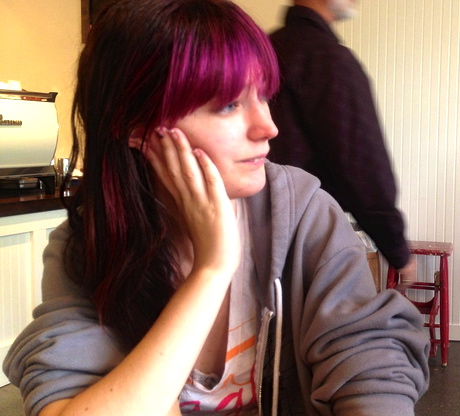 a woman with purple hair