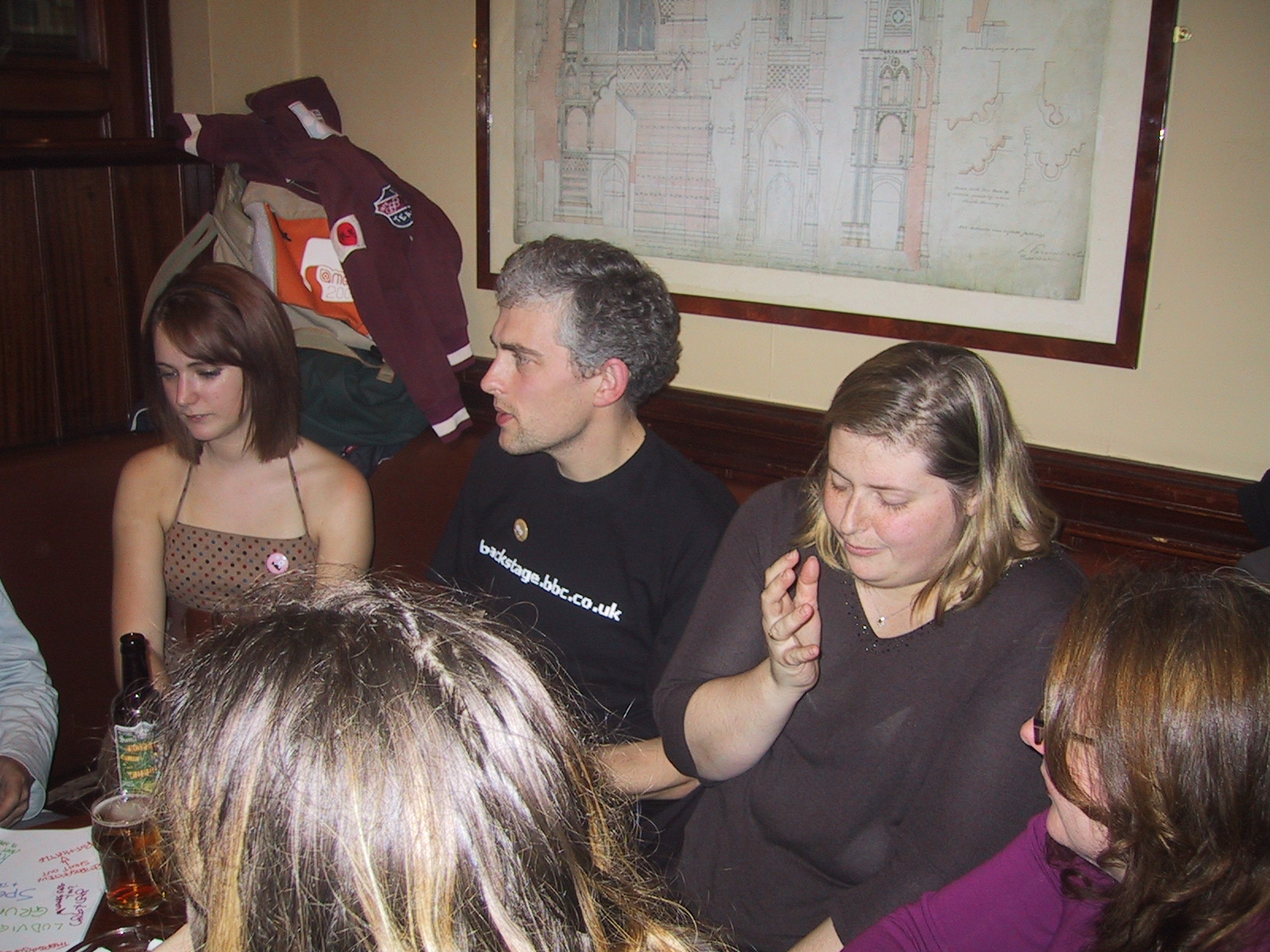 a group of people sitting around a table