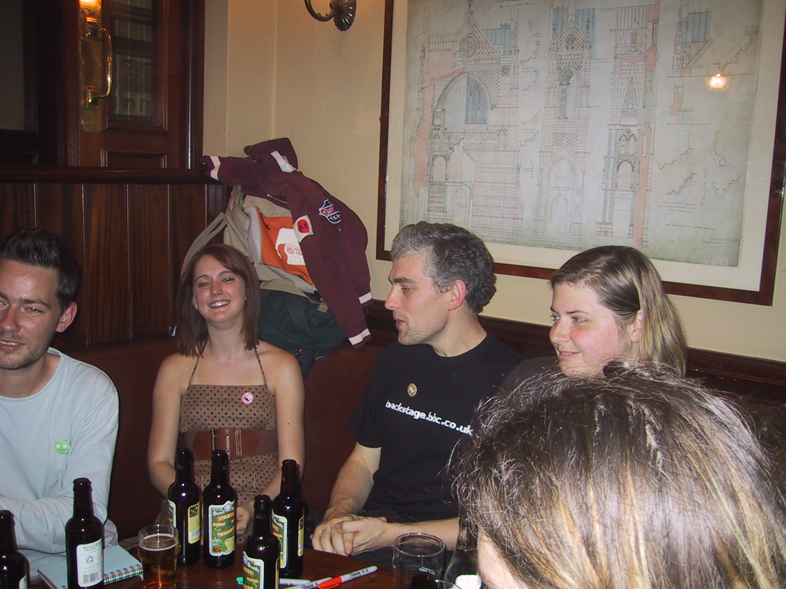 a group of people sitting around a table