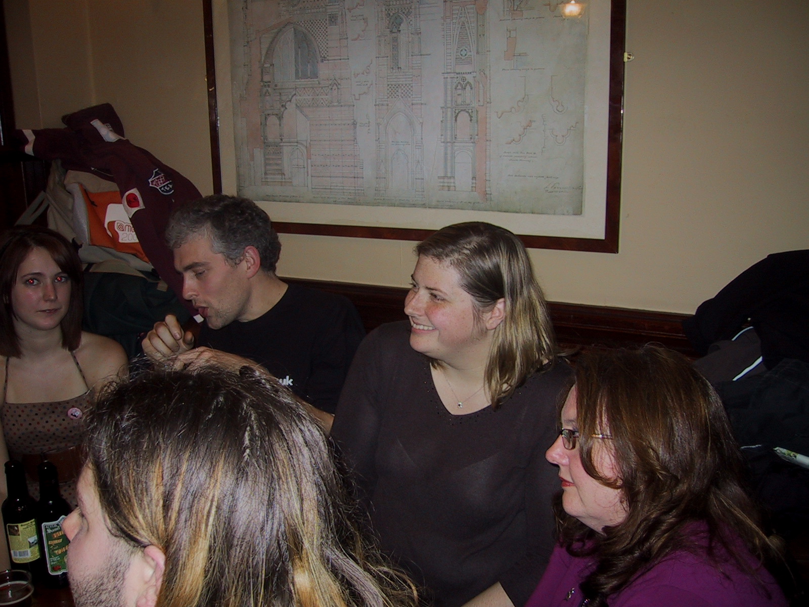 a group of people sitting around a table