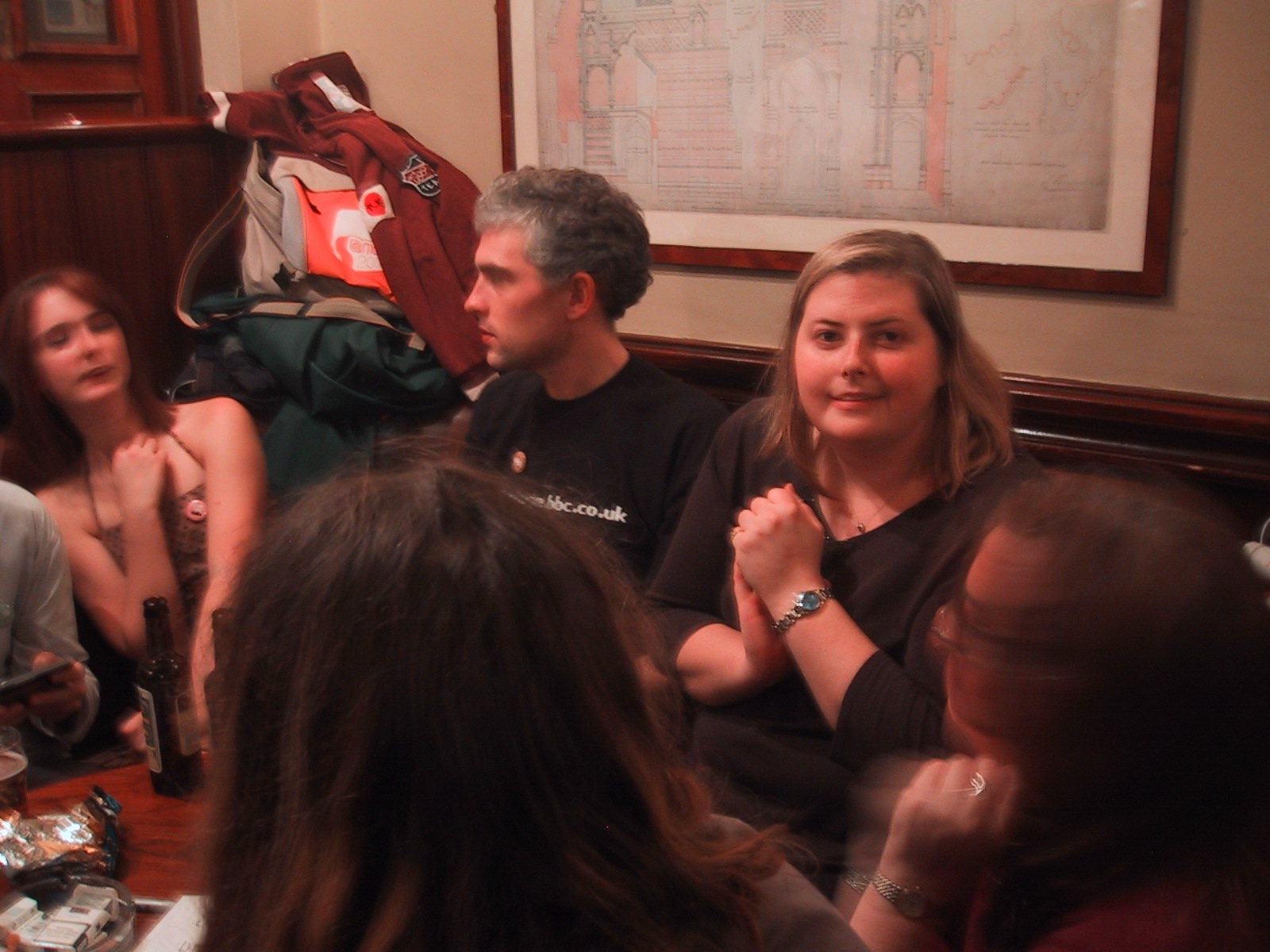 a group of people sitting around a table