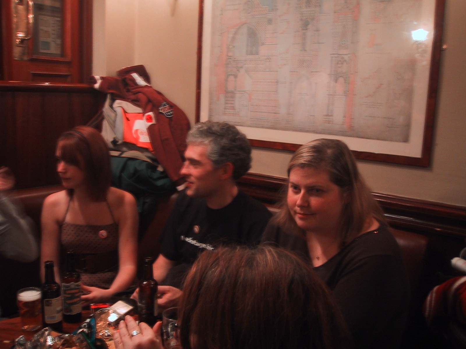 a group of people sitting around a table