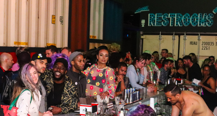 a group of people sitting at a bar aki STOCKS

Pret a