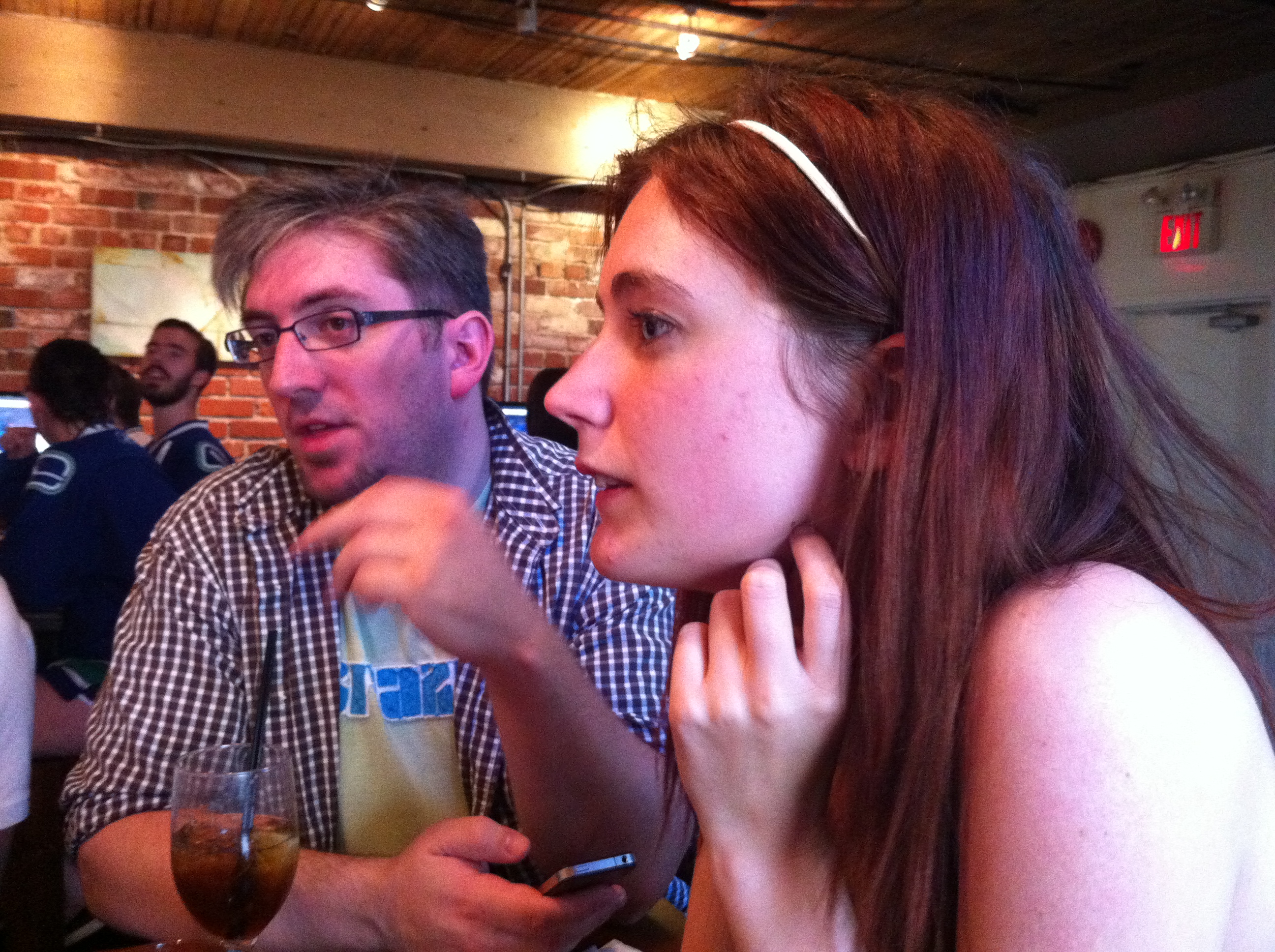 a man and a woman sitting at a table