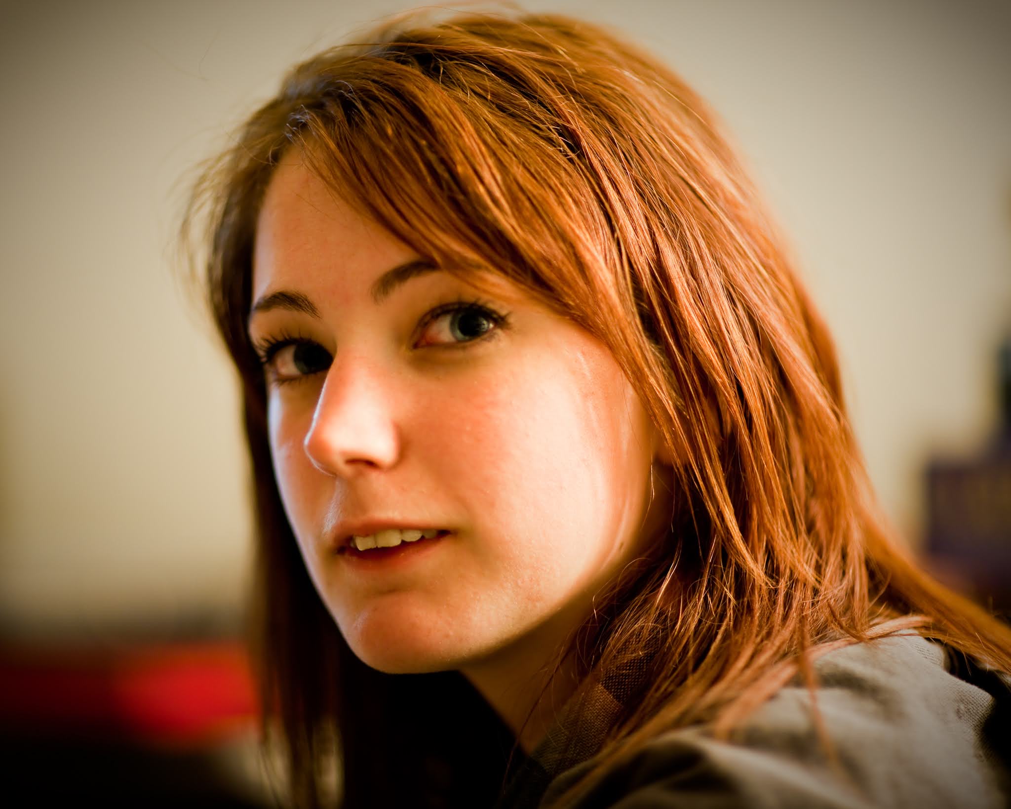 a woman with long red hair