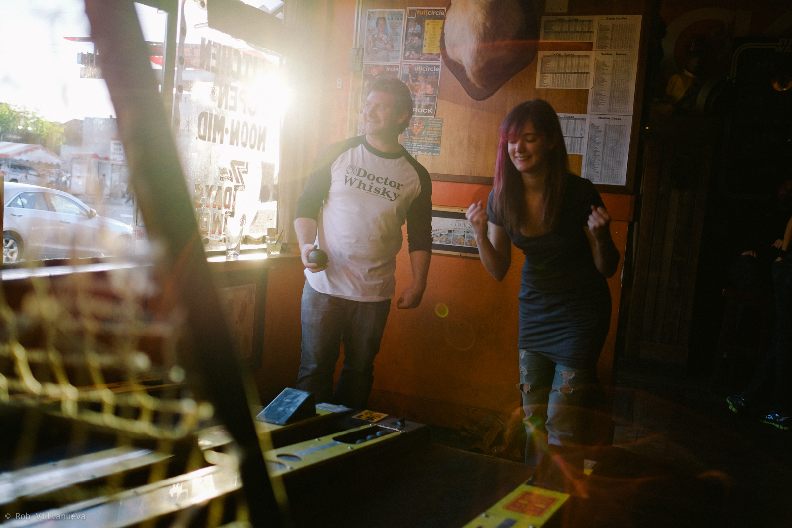 a man and a woman standing in a room