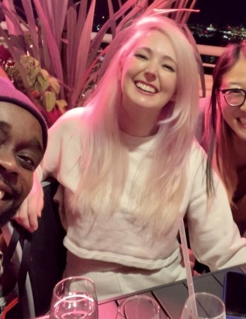 a group of people sitting at a table