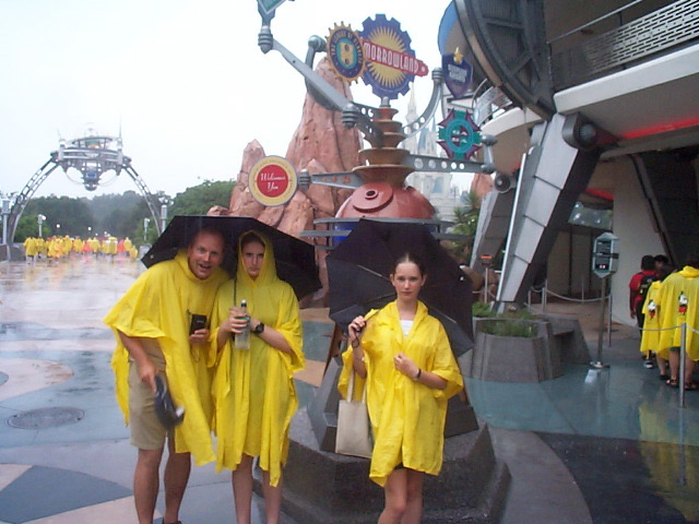 a group of people in yellow rain ponchs