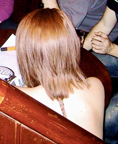 a group of people sitting around a table