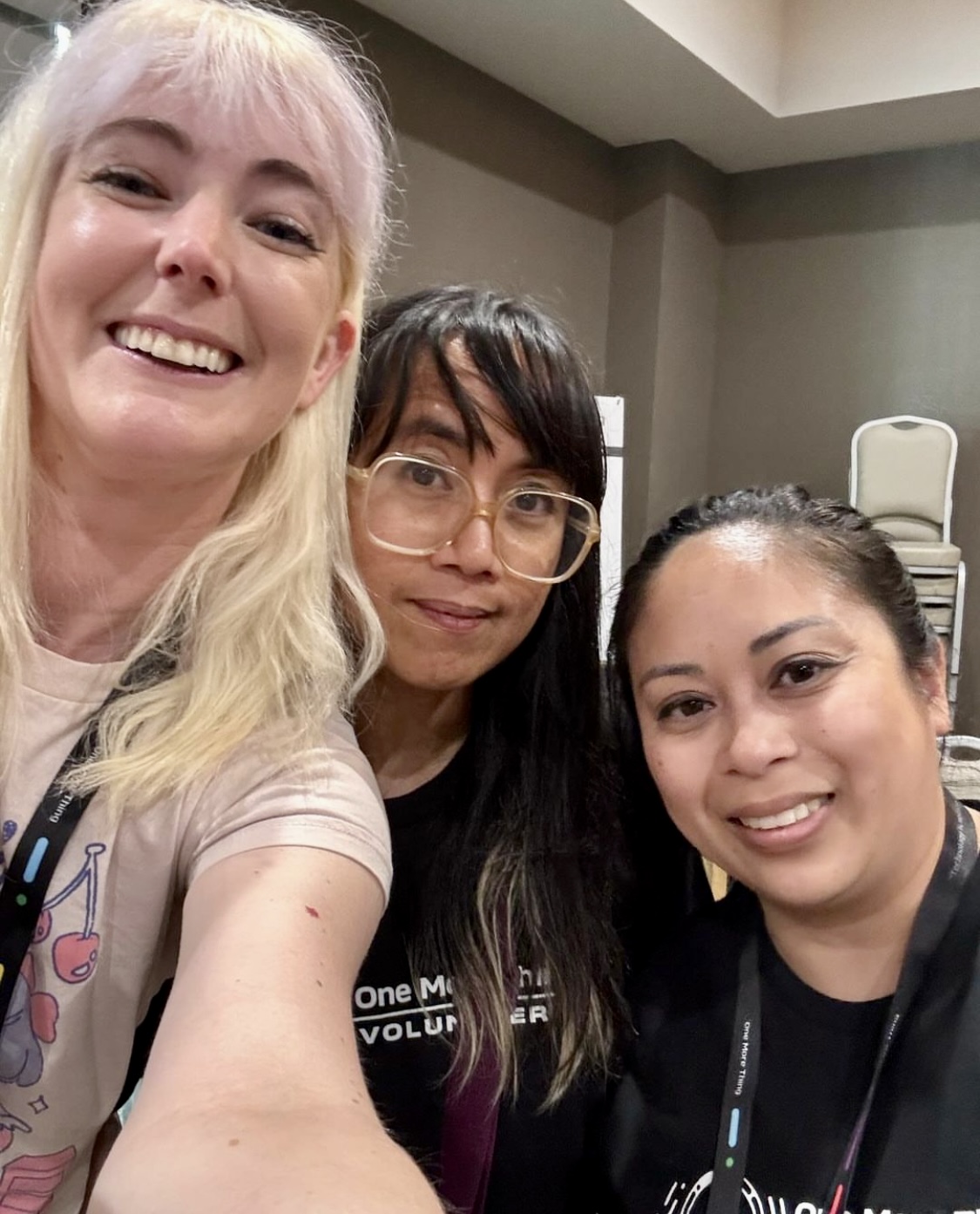 two women smiling and taking a selfie