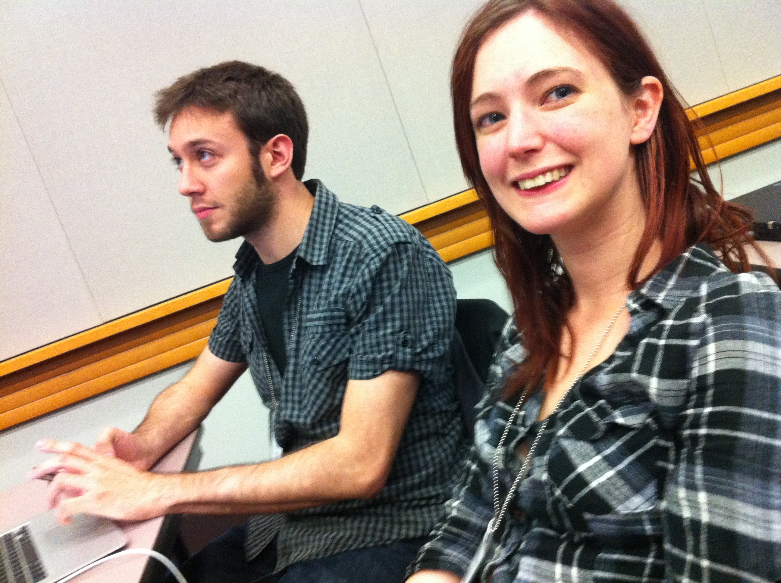 a man and a woman sitting on a couch