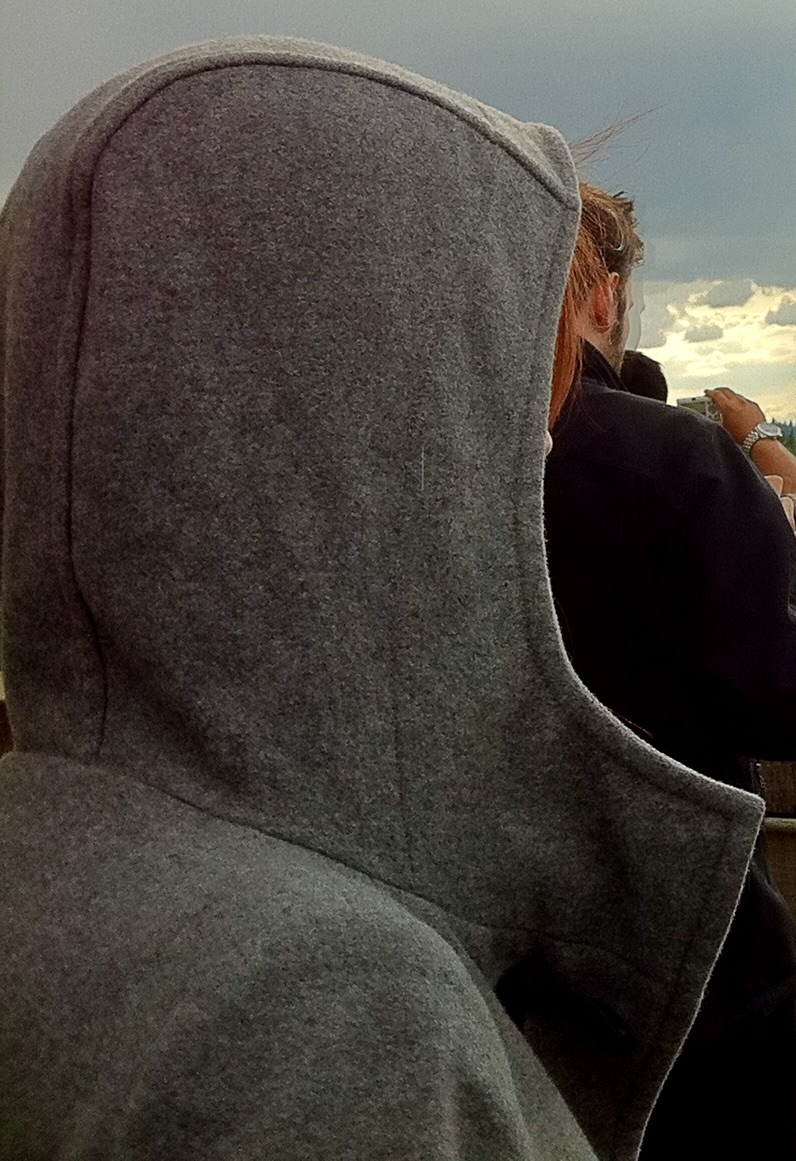 a person wearing a hoodie