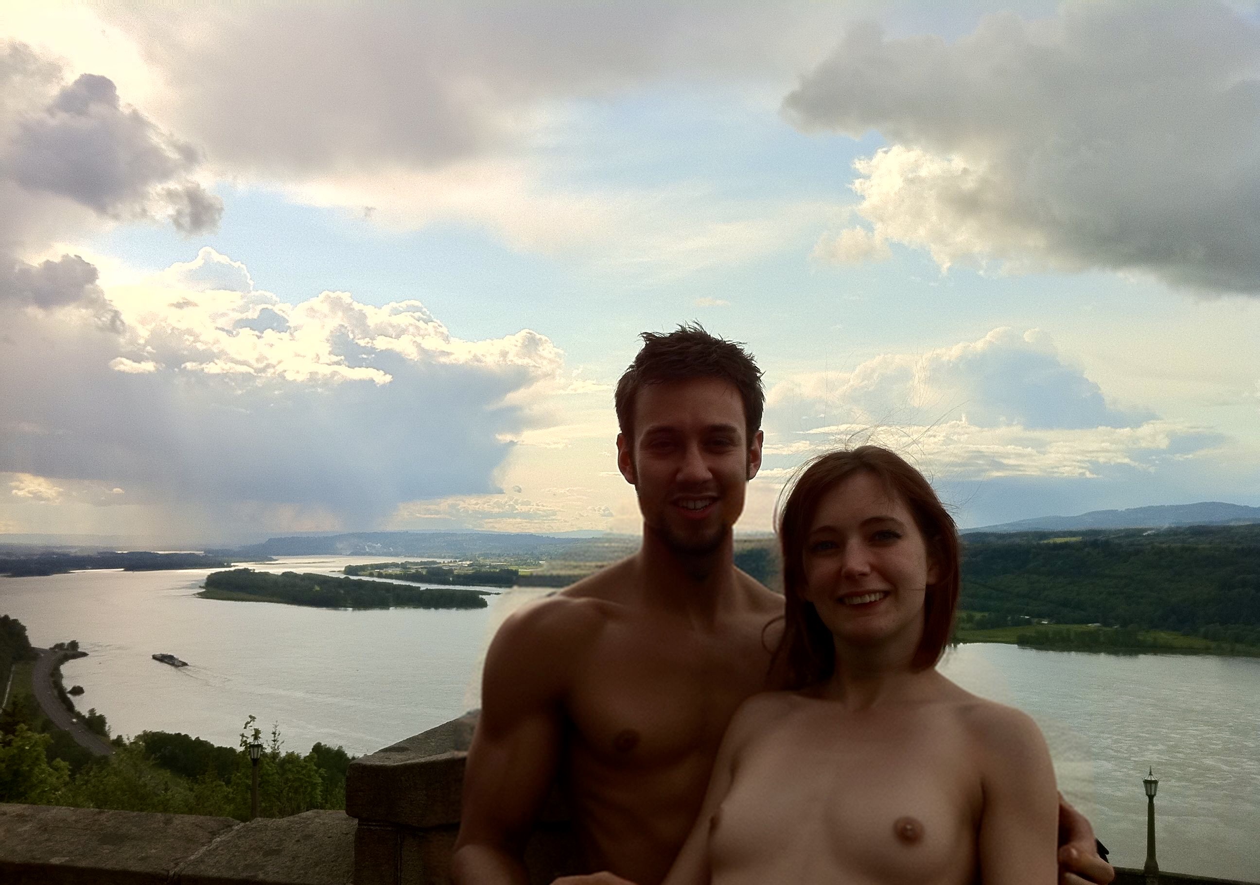 a man and a woman are posing for a picture